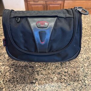Tumi Tech Hanging Black Toiletry Bag with Red Accents